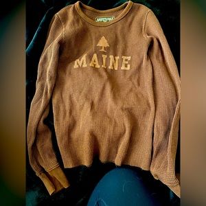 Women’s long sleeved thermal shirt.